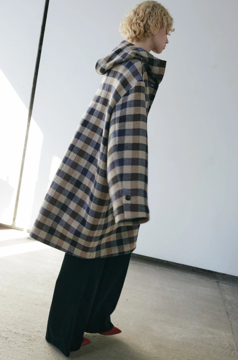 Hannes Roether - Full Length Plaid or Black Coat